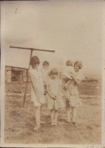 Young Gail McGhee in front, center. The shed in the background might be the wash house that the badger lived in, where he dug tunnels in the dirt floor. 