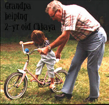 Grandpa_Clyde_helping_Chhaya_bicycle